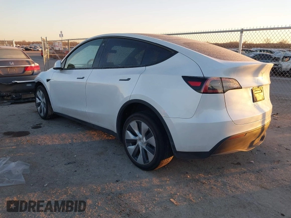 2023 Tesla Model Y Long Range z VIN 7SAYGDEE6PA061228, wystawiony jako IAAI lot #41371547 z przebiegiem 25 121 mil mil oraz . Historia ofert i sprzedaży dostępna na DreamBid. Obrazek 3.