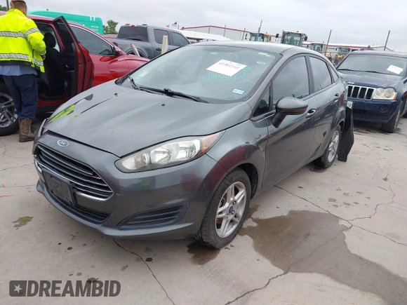 2018 Ford Fiesta SE with VIN 3FADP4BJXJM136232, listed as a IAAI auction lot 41901540 with 119,065 mi miles and . Bid and sale history available at DreamBid. Image 2.