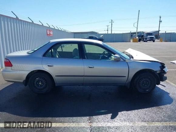 1999 Honda Accord LX with VIN JHMCG5545XC028563, listed as a IAAI auction lot 42461054 with 212,100 mi miles and . Bid and sale history available at DreamBid. Image 14.