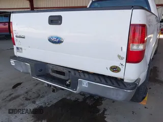 2006 Ford F-150 STX with VIN 1FTRX14WX6NA33218, listed as a IAAI auction lot 41667598 with 318,824 mi miles. Bid and sale history available at carsss.com. Image 6.