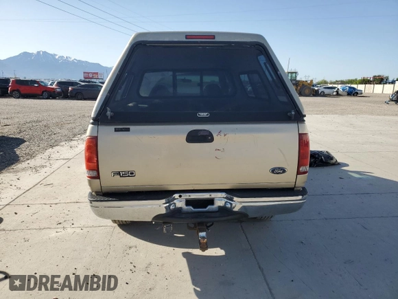 1999 Ford F-150 XL with VIN 1FTRX18L5XKA44484, listed as a Copart auction lot 56232815 with 177,990 mi miles and Salvage title. Bid and sale history available at DreamBid. Image 6.