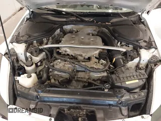 2005 Nissan 350Z Touring with VIN JN1AZ36A45M754923, listed as a IAAI auction lot 41720671 with 124,916 mi miles. Bid and sale history available at carsss.com. Image 10.