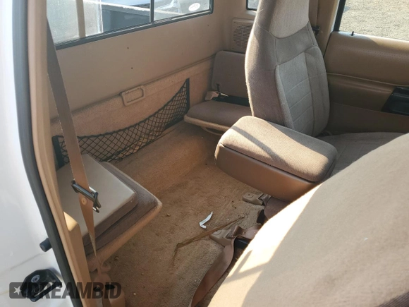 1995 Ford Ranger Splash z VIN 1FTCR14U4SPB12641, wystawiony jako Copart lot #51547255 z przebiegiem 106 647 mil mil oraz Szkoda całkowita • Salvage title. Historia ofert i sprzedaży dostępna na DreamBid. Obrazek 11.