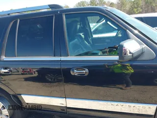 2013 Lincoln Navigator z VIN 5LMJJ2H53DEL00520, wystawiony jako IAAI lot #41769449 z przebiegiem 167 569 mil mil oraz . Historia ofert i sprzedaży dostępna na DreamBid. Obrazek 13.