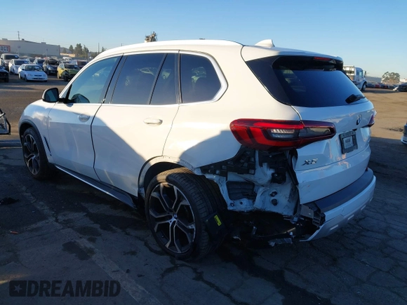 2021 BMW X5 sDrive40i with VIN 5UXCR4C03M9G59554, listed as a IAAI auction lot 41358056 with 47,577 mi miles. Bid and sale history available at carsss.com. Image 3.