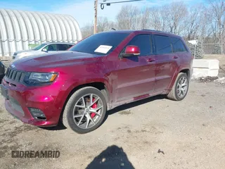 2017 Jeep Grand Cherokee SRT with VIN 1C4RJFDJ1HC754559, listed as a IAAI auction lot 41461029 with 100,096 mi miles. Bid and sale history available at carsss.com. Image 2.
