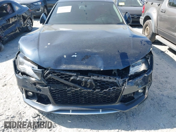 2012 Audi A7 Prestige with VIN WAUSGAFC0CN008552, listed as a IAAI auction lot 42068614 with 107,400 mi miles and . Bid and sale history available at DreamBid. Image 6.