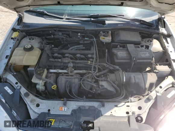 2007 Ford Focus S with VIN 1FAHP34N77W364581, listed as a Copart auction lot 52179835 with 111,701 mi miles and Salvage Title. Bid and sale history available at carsss.com. Image 11.