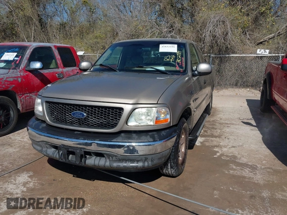 2002 Ford F-150 XL with VIN 1FTRX17242NA02789, listed as a IAAI auction lot 41832186 with 262,253 mi miles. Bid and sale history available at carsss.com. Image 2.