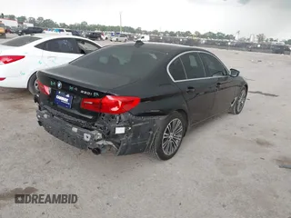 2019 BMW 5 Series 530i with VIN WBAJA5C58KWW11641, listed as a IAAI auction lot 41946359 with 48,635 mi miles and . Bid and sale history available at DreamBid. Image 4.