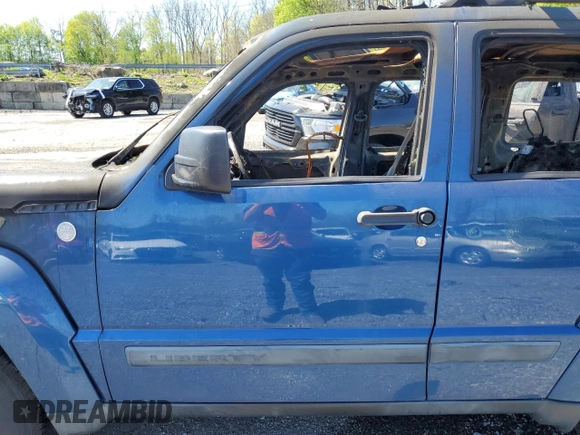 2010 Jeep Liberty Sport with VIN 1J4PN2GK1AW110261, listed as a Copart auction lot 54879855 with Not Provided miles and Salvage Title. Bid and sale history available at DreamBid. Image 7.