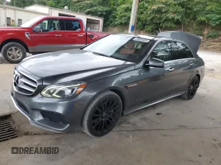 2014 Mercedes-Benz E 550 Sport with VIN WDDHF9BB8EB031664, listed as a Copart auction lot 59894955 with 133,590 mi miles and Salvage title. Bid and sale history available at DreamBid. Image 1.