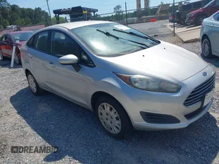 2019 Ford Fiesta S z VIN 3FADP4AJXKM116422, wystawiony jako IAAI lot #42197147 z przebiegiem 153 091 mil mil oraz . Historia ofert i sprzedaży dostępna na DreamBid. Obrazek 1.