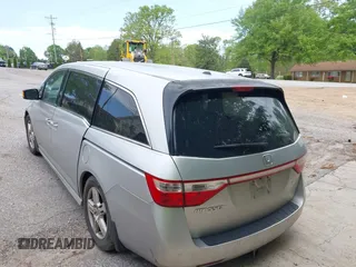 2012 Honda Odyssey Touring with VIN 5FNRL5H95CB101605, listed as a IAAI auction lot 42025163 with 286,421 mi miles. Bid and sale history available at carsss.com. Image 3.
