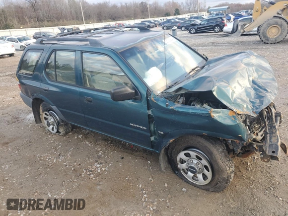 1999 Isuzu Rodeo S with VIN 4S2CK58W2X4312468, listed as a Copart auction lot 85753294 with Not Provided miles and Salvage Title. Bid and sale history available at DreamBid. Image 4.