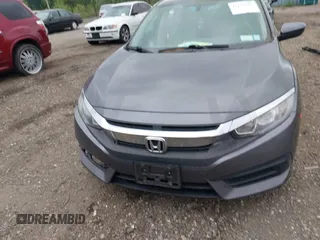 2017 Honda Civic LX z VIN 2HGFC2F54HH527421, wystawiony jako IAAI lot #42329336 z przebiegiem 97 655 mil mil oraz . Historia ofert i sprzedaży dostępna na DreamBid. Obrazek 12.