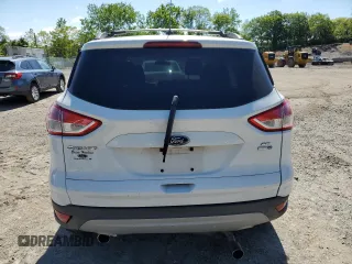 2013 Ford Escape SE z VIN 1FMCU9G99DUC73121, wystawiony jako Copart lot #57966605 z przebiegiem 169 764 mil mil oraz Szkoda całkowita • Salvage title. Historia ofert i sprzedaży dostępna na DreamBid. Obrazek 6.