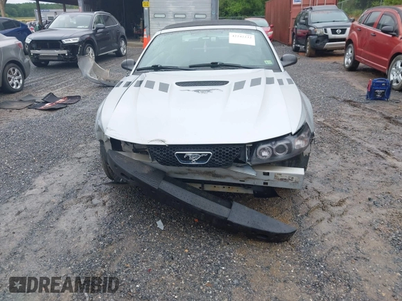 2002 Ford Mustang Deluxe z VIN 1FAFP44492F221578, wystawiony jako IAAI lot #42242232 z przebiegiem 107 773 mil mil oraz . Historia ofert i sprzedaży dostępna na DreamBid. Obrazek 13.
