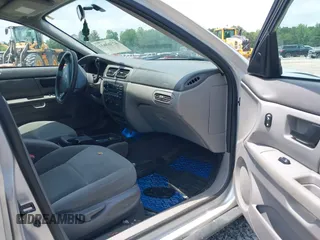 2006 Ford Taurus SE z VIN 1FAFP53UX6A105350, wystawiony jako IAAI lot #42363631 z przebiegiem 107 825 mil mil oraz . Historia ofert i sprzedaży dostępna na DreamBid. Obrazek 5.