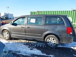2016 Dodge Grand Caravan SE with VIN 2C4RDGBG1GR211030, listed as a IAAI auction lot 41386099 with 73,244 mi miles and . Bid and sale history available at DreamBid. Image 14.