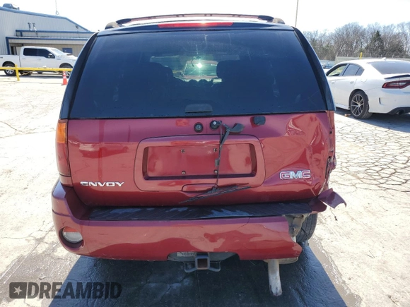 2006 GMC Envoy SLE z VIN 1GKDT13S262210046, wystawiony jako Copart lot #49335595 z przebiegiem 292 940 mil mil oraz Szkoda całkowita • Salvage title. Historia ofert i sprzedaży dostępna na DreamBid. Obrazek 6.