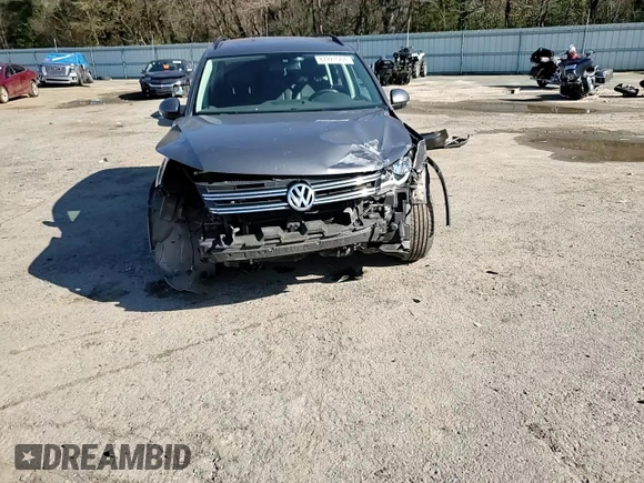 2016 Volkswagen Tiguan S with VIN WVGBV7AX0GW524346, listed as a Copart auction lot 87221564 with 163,609 mi miles and Salvage Title. Bid and sale history available at DreamBid. Image 11.