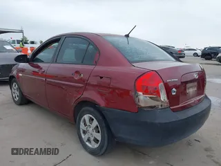 2007 Hyundai Accent GLS with VIN KMHCN46C57U108605, listed as a IAAI auction lot 41932061 with 195,580 mi miles. Bid and sale history available at carsss.com. Image 3.
