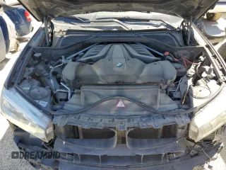 2017 BMW X5 xDrive50i z VIN 5UXKR6C39H0U13732, wystawiony jako Copart lot #49181165 z przebiegiem 129 644 mil mil oraz Szkoda całkowita • Salvage title. Historia ofert i sprzedaży dostępna na DreamBid. Obrazek 12.