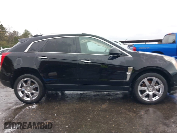 2011 Cadillac SRX Performance Collection with VIN 3GYFNBEYXBS597881, listed as a IAAI auction lot 41016643 with 164,781 mi miles and . Bid and sale history available at carsss.com. Image 13.
