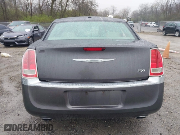 2014 Chrysler 300 with VIN 2C3CCAAG7EH377454, listed as a IAAI auction lot 41964310 with 277,209 mi miles. Bid and sale history available at carsss.com. Image 17.