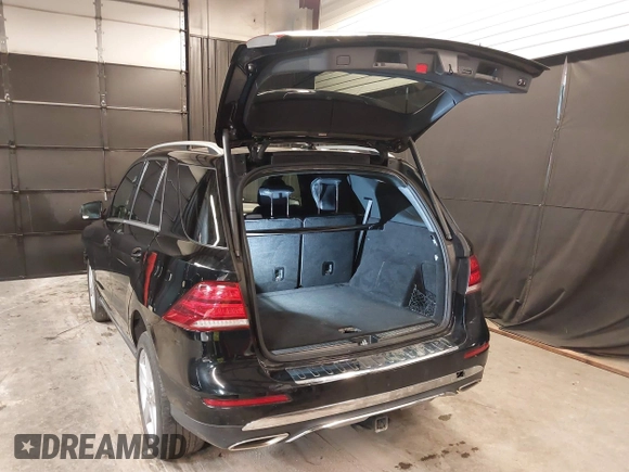 2019 Mercedes-Benz GLE 400 with VIN 4JGDA5GBXKB216718, listed as a IAAI auction lot 42531879 with 95,734 mi miles and . Bid and sale history available at DreamBid. Image 3.