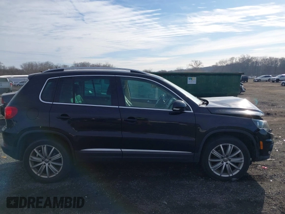 2012 Volkswagen Tiguan SE with VIN WVGAV7AX3CW531264, listed as a IAAI auction lot 41651242 with 190,669 mi miles and . Bid and sale history available at DreamBid. Image 13.