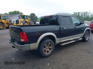 2009 Dodge 1500 Laramie z VIN 1D3HV13T69S799484, wystawiony jako IAAI lot #42312702 z przebiegiem 254 233 mil mil oraz . Historia ofert i sprzedaży dostępna na DreamBid. Obrazek 4.