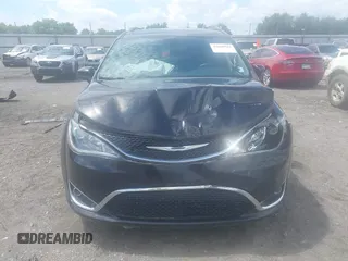2020 Chrysler Pacifica Touring L with VIN 2C4RC1BGXLR274315, listed as a IAAI auction lot 42608504 with 109,371 mi miles and . Bid and sale history available at DreamBid. Image 12.