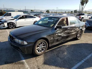2003 BMW 5 Series 525i with VIN WBADT33433GF43797, listed as a Copart auction lot 70476904 with 194,319 mi miles and Salvage Title. Bid and sale history available at carsss.com. Image 1.