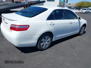 2007 Toyota Camry CE with VIN JTNBE46K473111827, listed as a IAAI auction lot 41872683 with 173,058 mi miles. Bid and sale history available at carsss.com. Image 4.