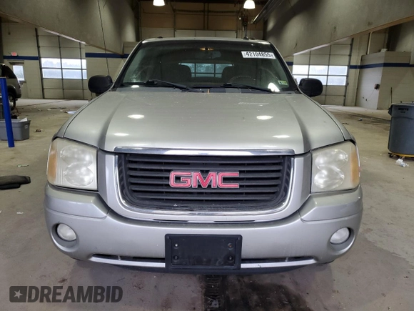 2005 GMC Envoy SLT with VIN 1GKDT13S652197929, listed as a Copart auction lot 42104855 with 228,515 mi miles and Salvage Title. Bid and sale history available at carsss.com. Image 5.