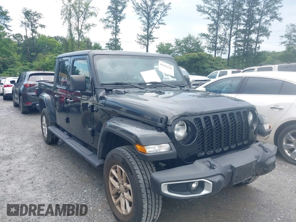 2023 Jeep Gladiator Sport S z VIN 1C6HJTAG3PL521954, wystawiony jako IAAI lot #42502126 z przebiegiem 49 606 mil mil oraz . Historia ofert i sprzedaży dostępna na DreamBid. Obrazek 1.
