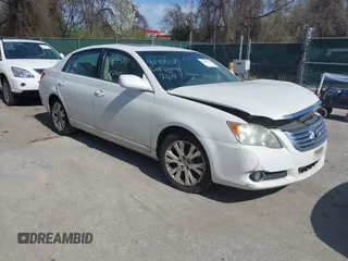 2010 Toyota Avalon XL with VIN 4T1BK3DB7AU361053, listed as a IAAI auction lot 41905329 with 263,349 mi miles and . Bid and sale history available at carsss.com. Image 1.