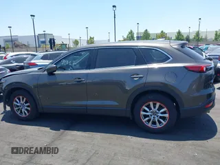 2017 Mazda CX-9 Touring with VIN JM3TCBCY1H0131233, listed as a IAAI auction lot 42490137 with 84,216 mi miles and . Bid and sale history available at DreamBid. Image 14.