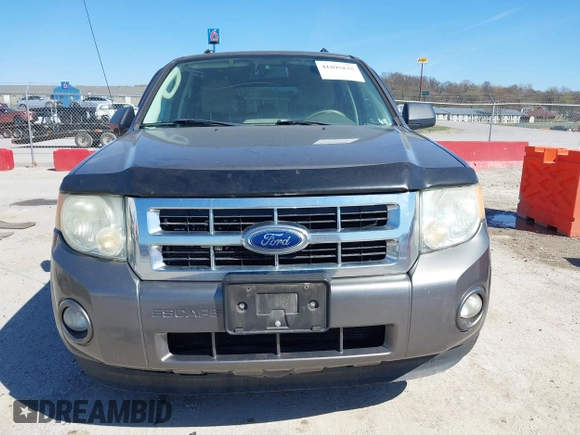 2011 Ford Escape XLT with VIN 1FMCU0D74BKA81385, listed as a IAAI auction lot 41895835 with 238,298 mi miles. Bid and sale history available at carsss.com. Image 12.