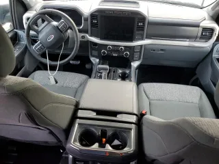 2023 Ford F-150 Lightning Pro z VIN 1FTVW1ELXPWG63466, wystawiony jako Copart lot #43397005 z przebiegiem 8 852 mil mil oraz Szkoda całkowita • Salvage title. Historia ofert i sprzedaży dostępna na DreamBid. Obrazek 8.