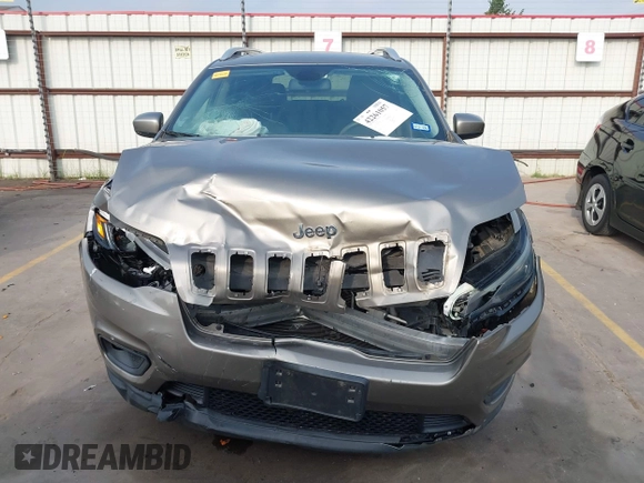 2019 Jeep Cherokee Latitude with VIN 1C4PJLCBXKD416644, listed as a IAAI auction lot 42261057 with 93,849 mi miles and . Bid and sale history available at DreamBid. Image 6.