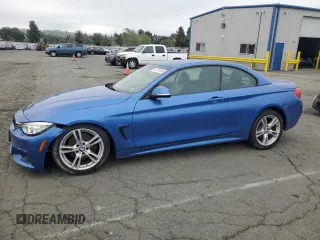 2015 BMW 4 Series 428i with VIN WBA3V7C54FP771931, listed as a Copart auction lot 53778755 with 51,411 mi miles and Salvage Title. Bid and sale history available at carsss.com. Image 1.