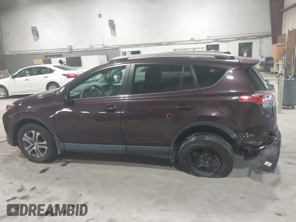 2018 Toyota RAV4 LE with VIN 2T3BFREV0JW759714, listed as a IAAI auction lot 41823084 with 119,909 mi miles and . Bid and sale history available at DreamBid. Image 14.