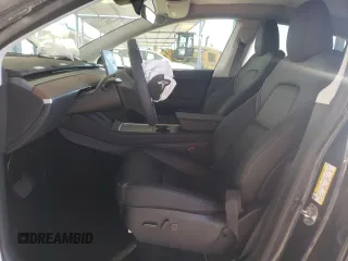 2024 Tesla Model Y Long Range with VIN 7SAYGDEE4RF127409, listed as a Copart auction lot 84274794 with 14,246 mi miles and Salvage title. Bid and sale history available at DreamBid. Image 7.