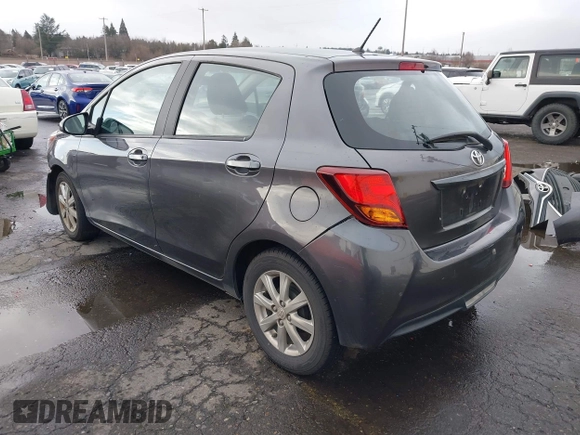 2015 Toyota Yaris L with VIN VNKKTUD38FA043393, listed as a IAAI auction lot 41573010 with 107,146 mi miles and . Bid and sale history available at DreamBid. Image 3.