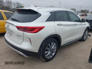 2021 Infiniti QX50 Essential z VIN 3PCAJ5CA0MF102828, wystawiony jako IAAI lot #41520222 z przebiegiem 66 264 mil mil oraz . Historia ofert i sprzedaży dostępna na DreamBid. Obrazek 4.