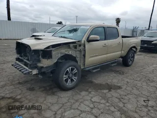 2018 Toyota Tacoma SR5 with VIN 3TMBZ5DN9JM017203, listed as a Copart auction lot 53499565 with 44,027 mi miles and Salvage title. Bid and sale history available at DreamBid. Image 1.