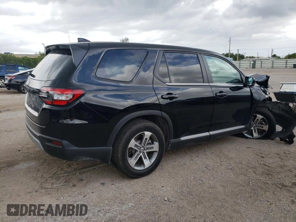 2024 Honda Pilot EX-L 8 Passenger with VIN 5FNYG2H47RB014185, listed as a Copart auction lot 67668944 with 3,981 mi miles and Salvage Title. Bid and sale history available at carsss.com. Image 3.